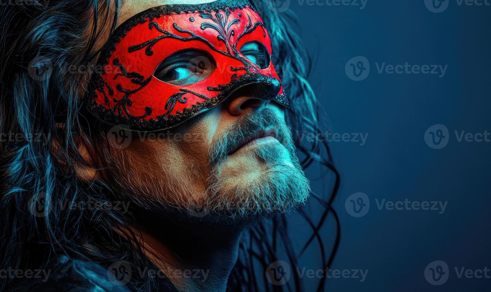 a man with long hair and a mask photo