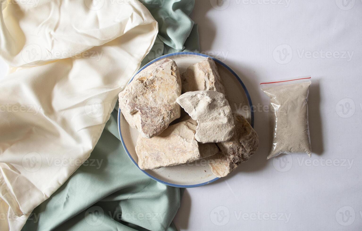 Edible White Clay Stones, with clay powder minimal flat lay photo