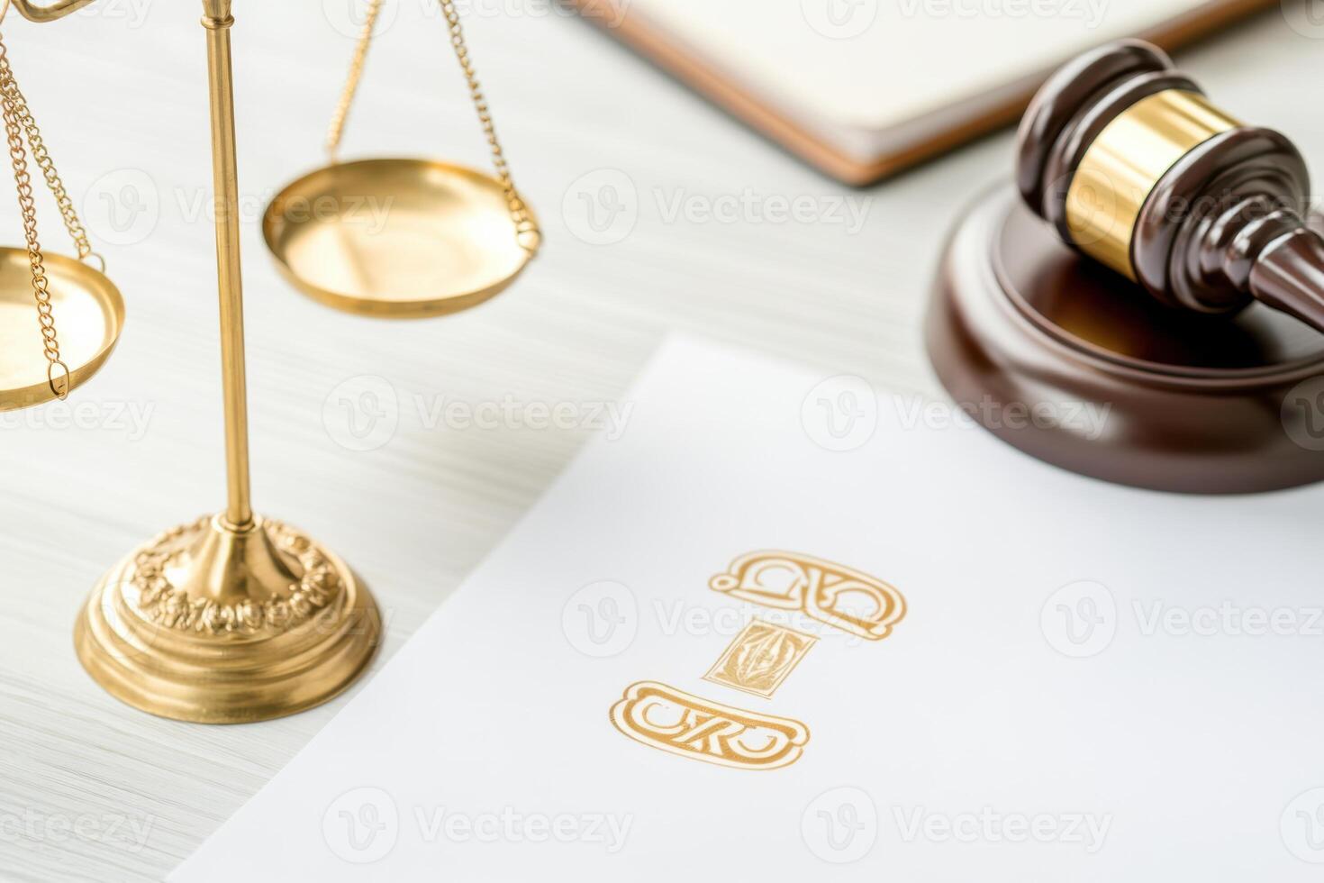 Symbolism of justice with scales and gavel placed on table alongside important legal document photo