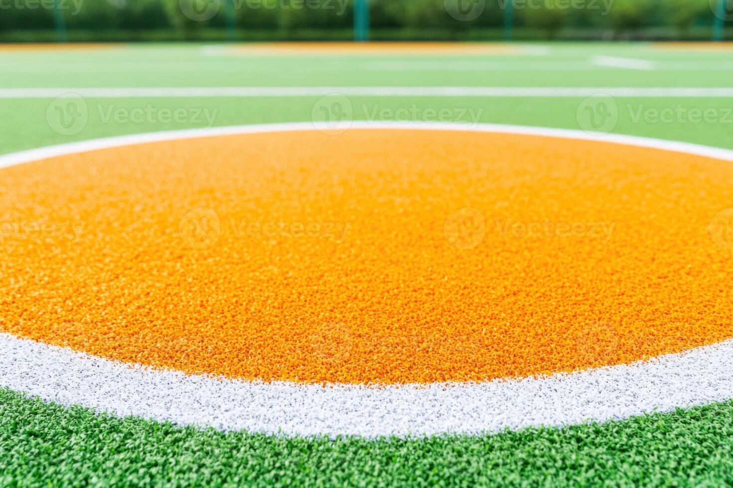 Sports training field featuring an orange target for agility drills and athlete practice sessions in a vibrant outdoor environment photo