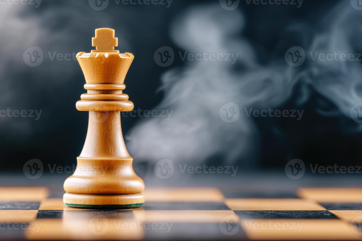 Dramatic chess battle with smoke rising and a fallen king on the chessboard under moody lighting photo