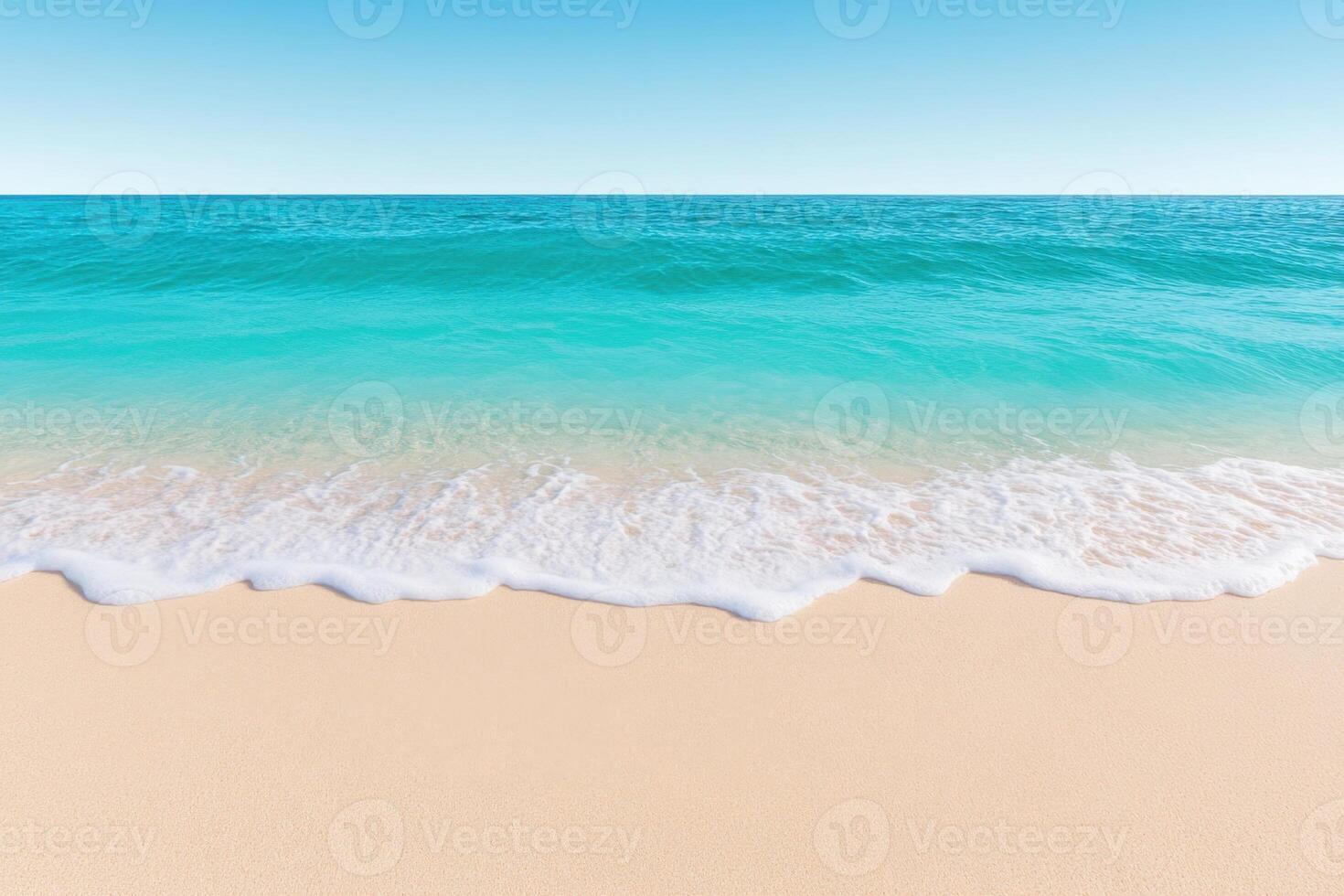 Breathtaking turquoise ocean gently lapping onto a pristine white sand beach under a soft gradient blue sky photo