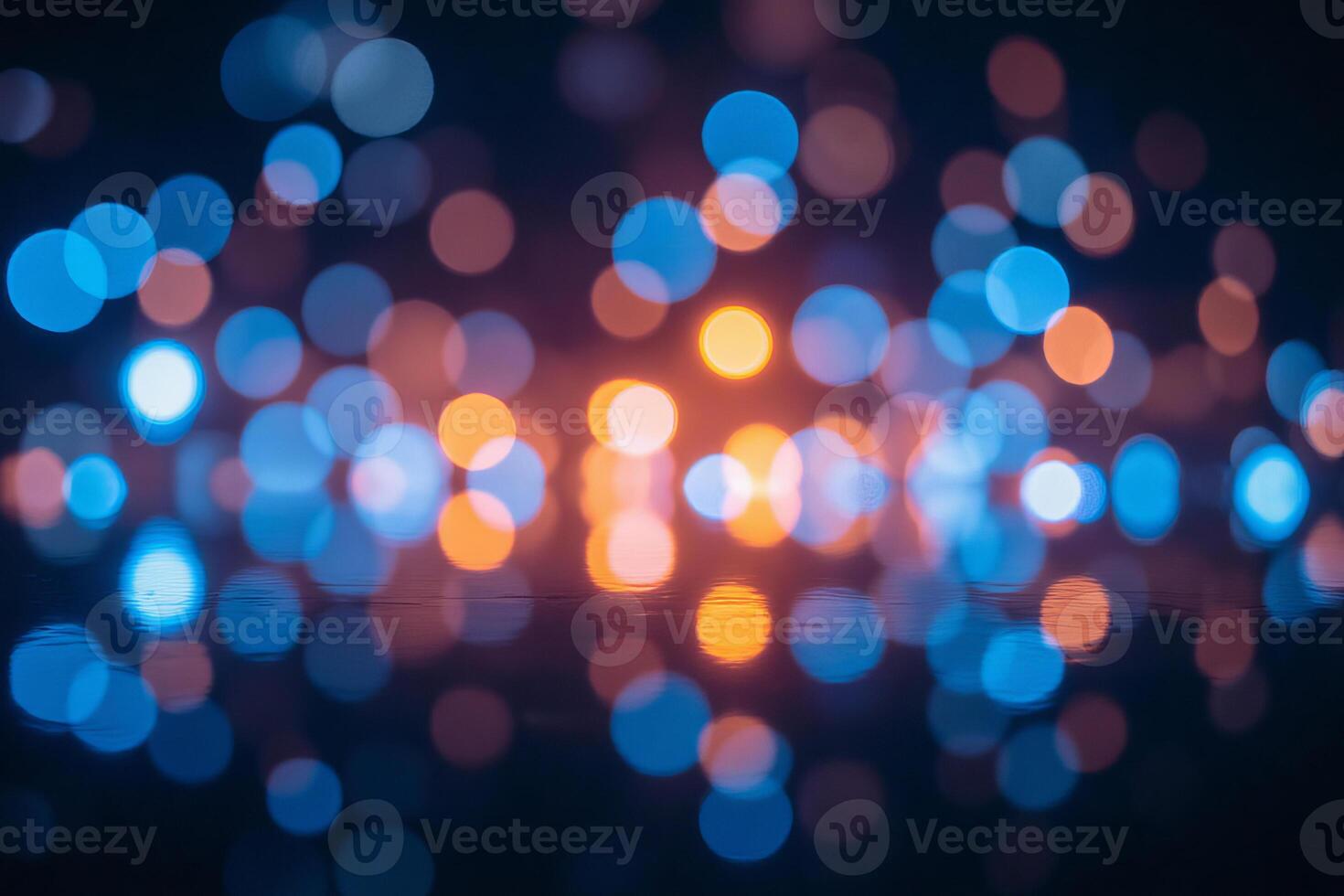 Bokeh of blue and orange lights, dark background, out of focus, soft lighting, abstract, blurred, night scene, festive atmosphere, vibrant colors photo