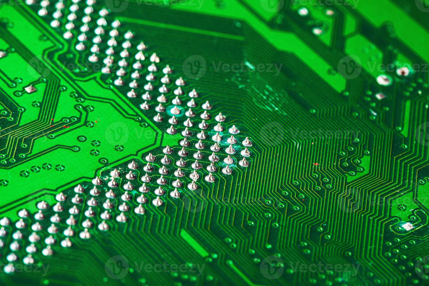 Green circuit board of a computer close up photo