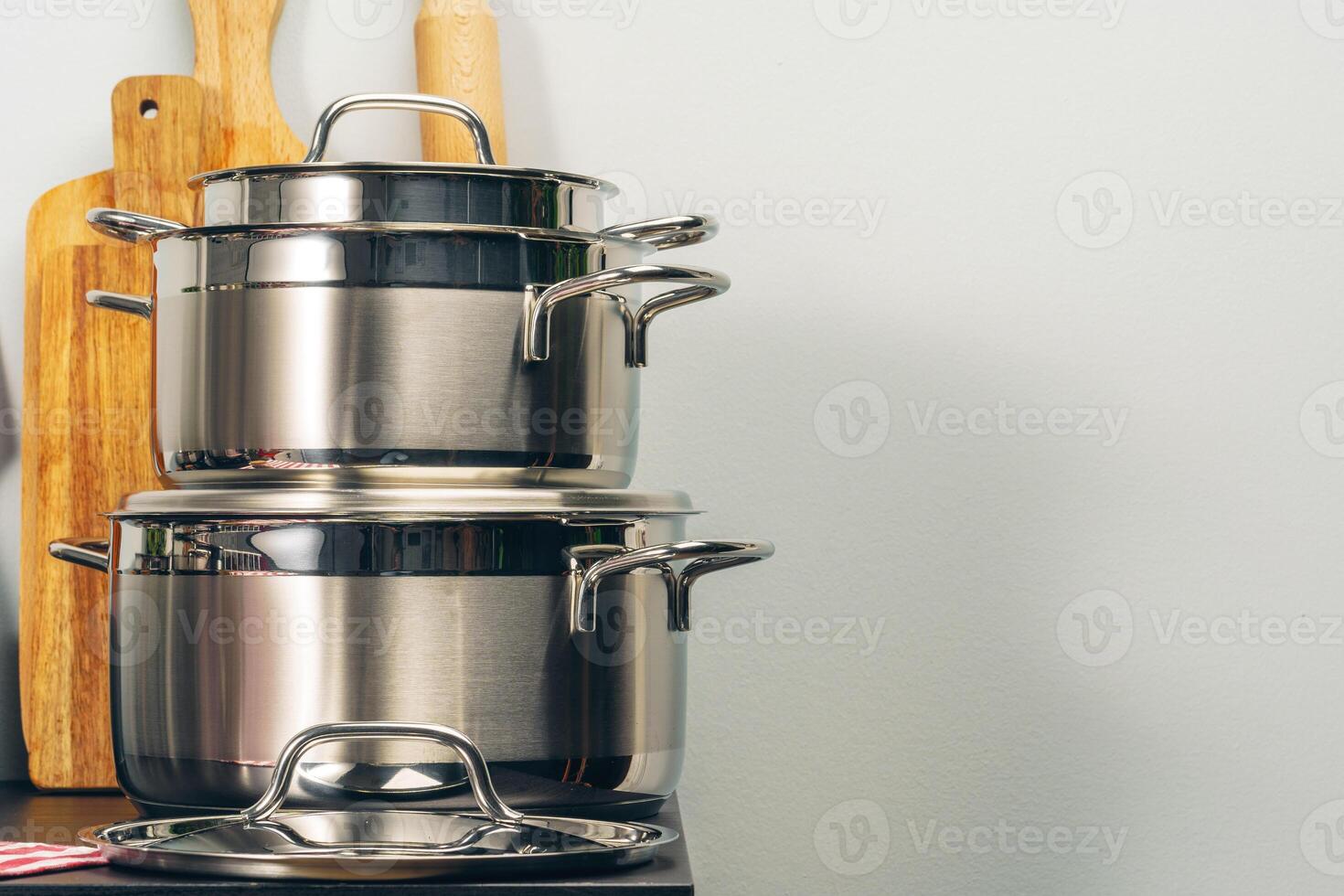 Set of cookware utensils on a kitchen counter photo