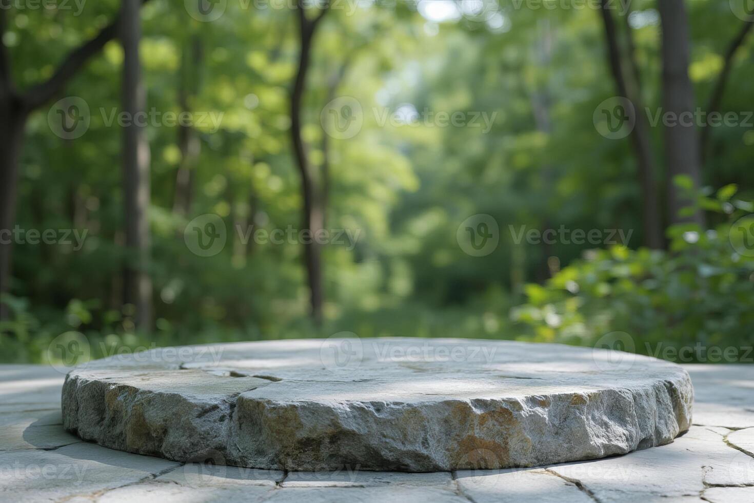 A stone table in a forest, the table is made of gray stone and has a rough surface, the background is a blur of green trees photo