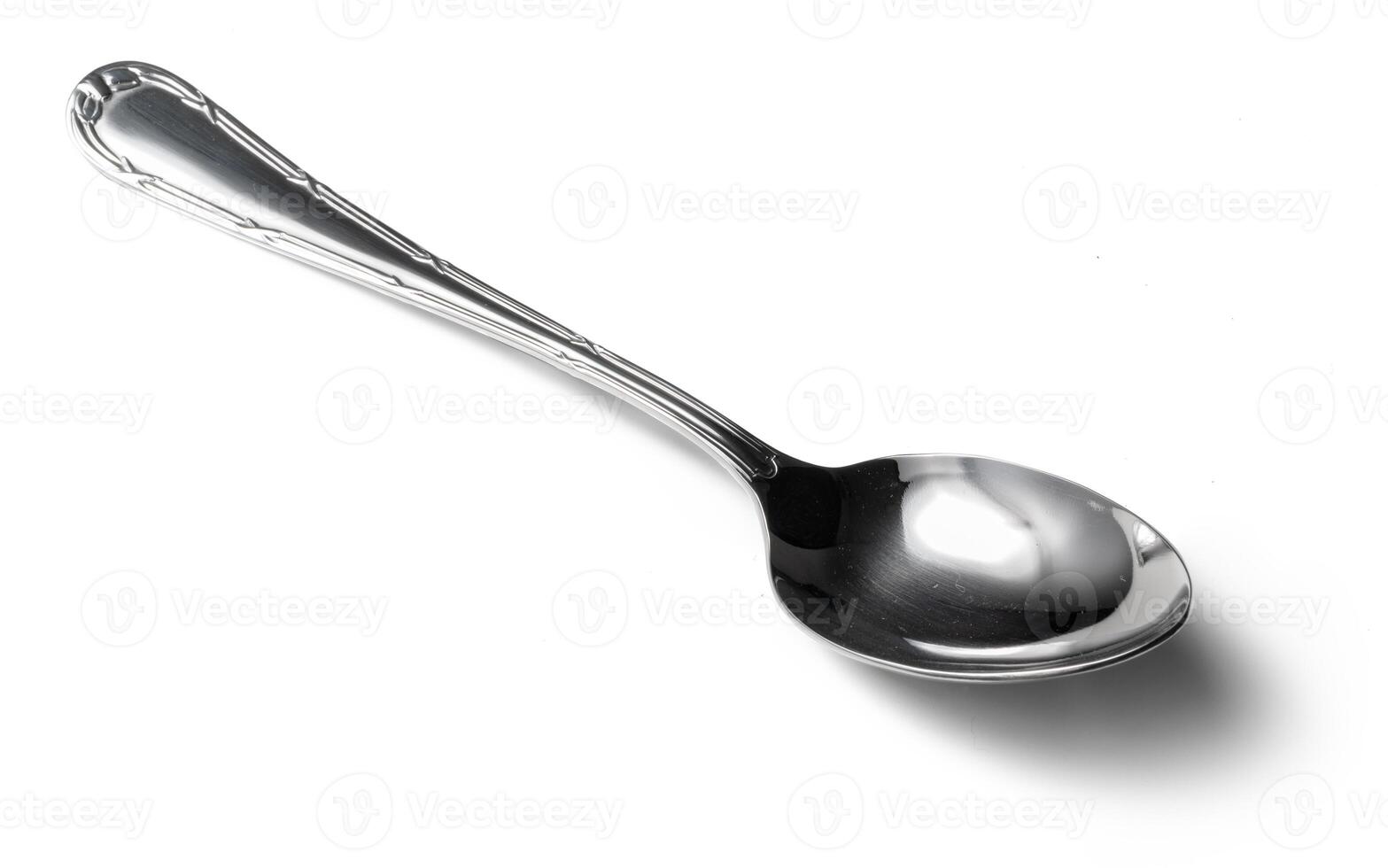 Stainless cutlery spoon isolated on white background photo