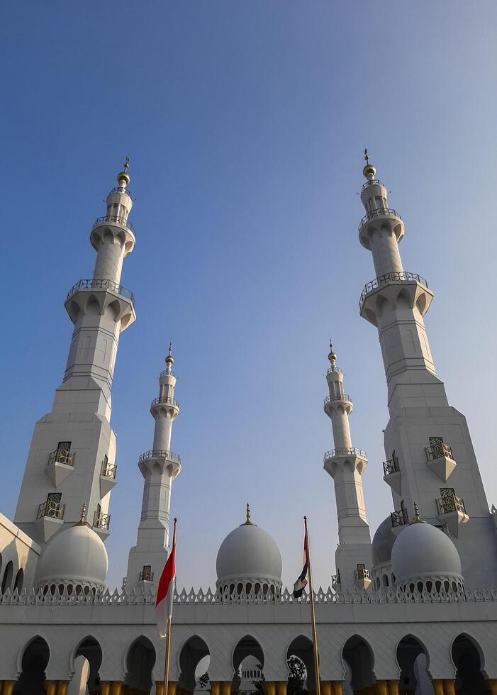 Surakarta, Indonesia - May 11, 2024 - Sheikh Zayed mosque in Solo, Indonesia. Beautiful architecture of the grand mosque with minarets, dome, and pillars. Place of worship for muslim. photo