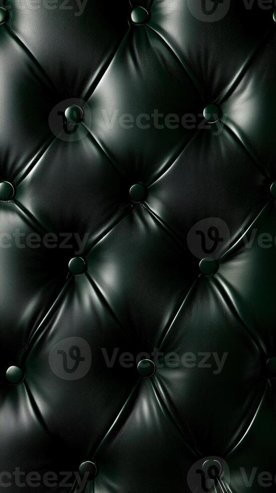 Refined green leather upholstery with deeply button-tufted design, presenting a luxurious texture, perfect for high-end furniture or elegant interior design. photo