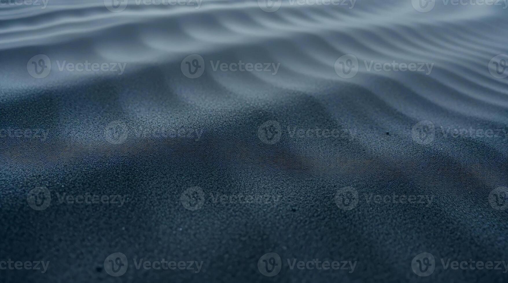 A close up of a black sand dune photo
