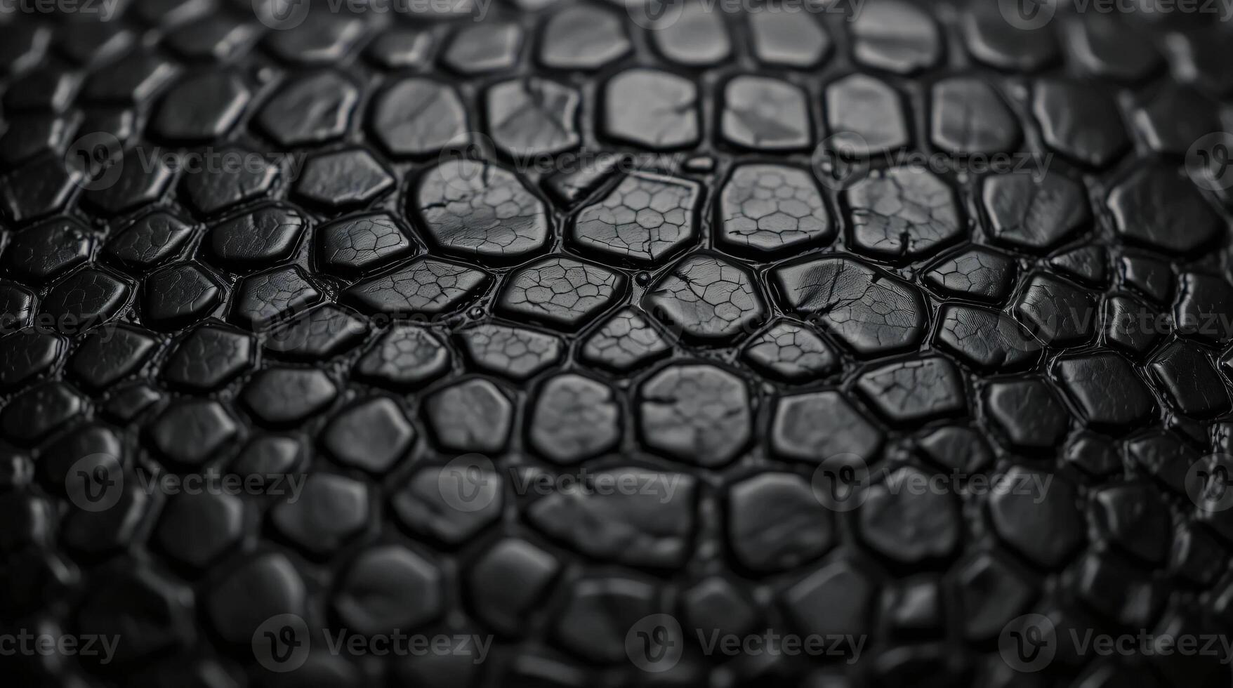 A black leather texture with a lot of cracks photo