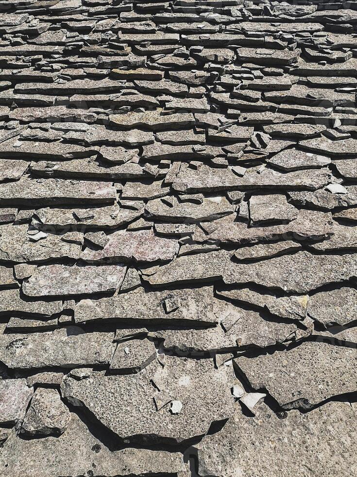 Old Stone Roof Tiles on House in Gjirokastra photo