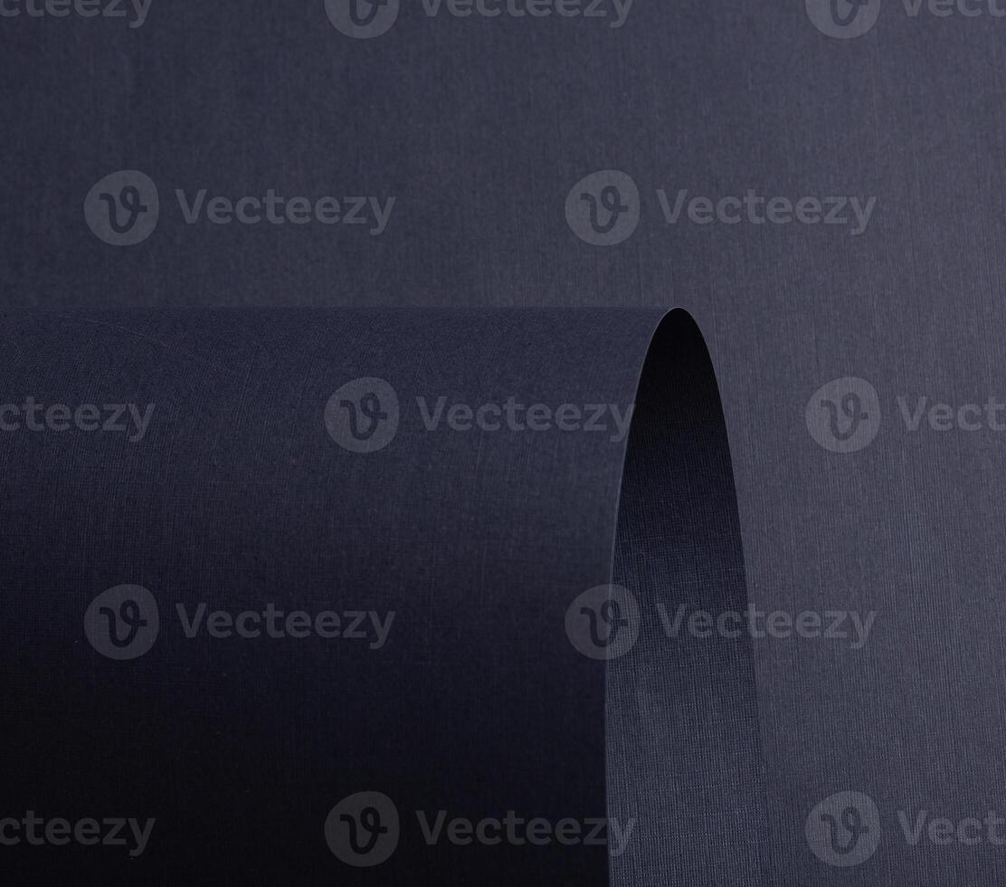 Navy, blue, and midnight indigo paper with smooth texture. Deep, rich folded curves create an photo
