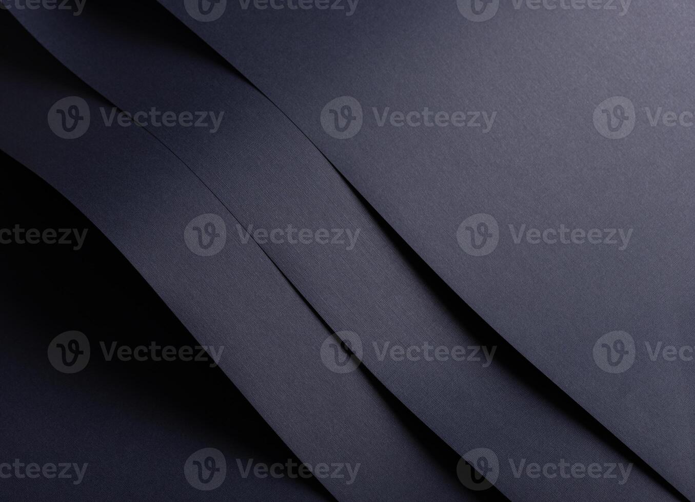 Blue, navy, deep blue, and indigo paper with subtle grain texture. Layered folds and sleek curves photo