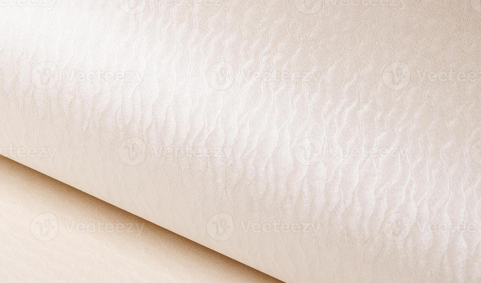 Ivory and cream paper with embossed, rippled texture and elegant wave design. Shiny, pearlescent photo