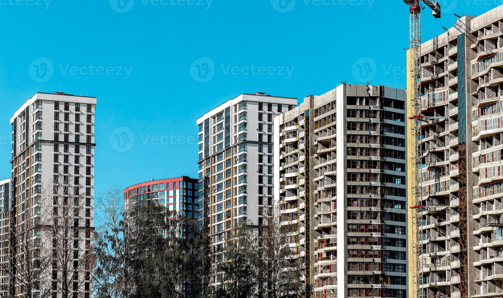 Modern high-rise condominium in metropolitan downtown. Concrete structure with large windows photo