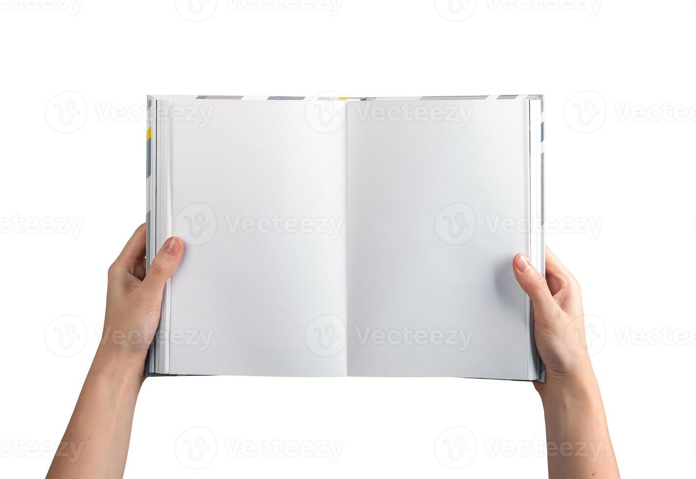 A person holding an open, blank book or journal with both hands, showcasing clean, white pages. photo