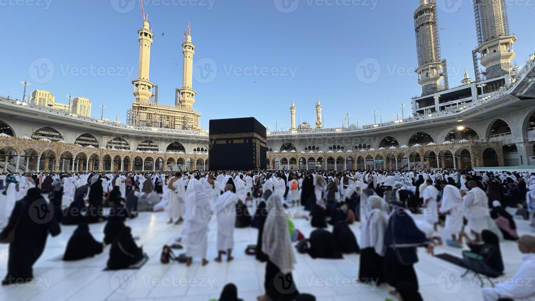 Muslim pilgrims perform Tawaf around the Kaaba after dawn prayer at Masjid al-Haram in Makkah, Saudi Arabia. Muslims worldwide face the Kaaba in prayer, symbolizing unity and devotion in Islam photo