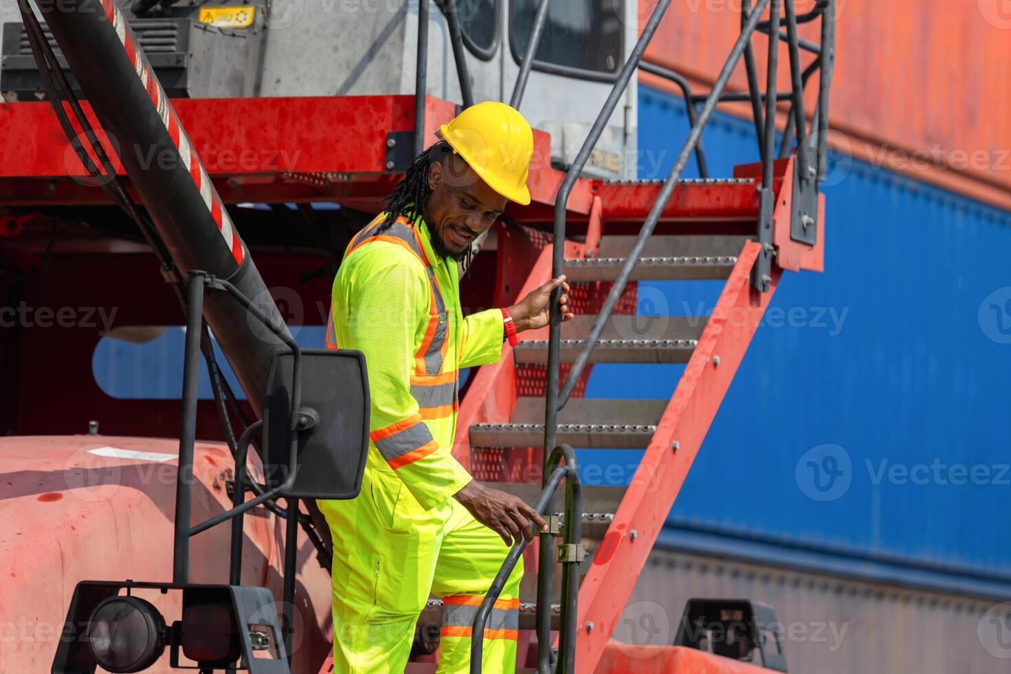 Construction Worker in Safety Gear at Industrial Site, Dock Worker at Cargo Container Ship Port Warehouse photo