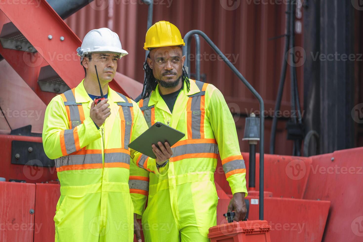 Engineer man Team in Safety Gear Control Containers Box at Industrial Site, Container Yard Workers Discussion at Shipping Yard photo