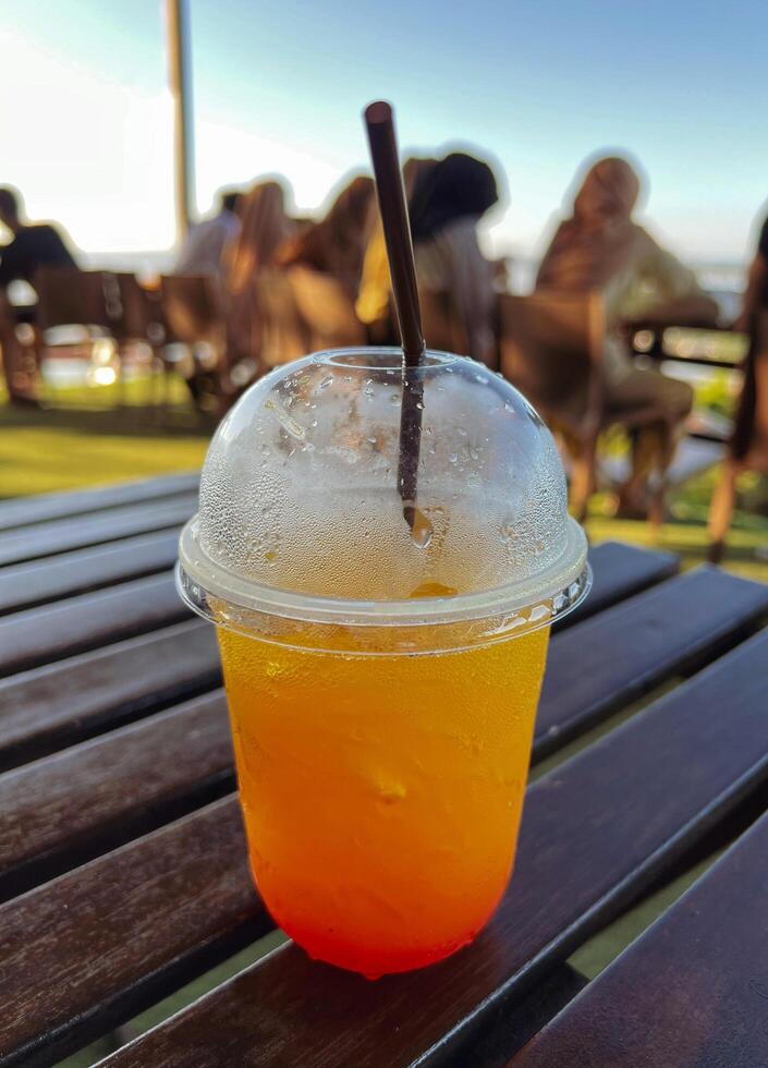 A drink sitting on a table photo