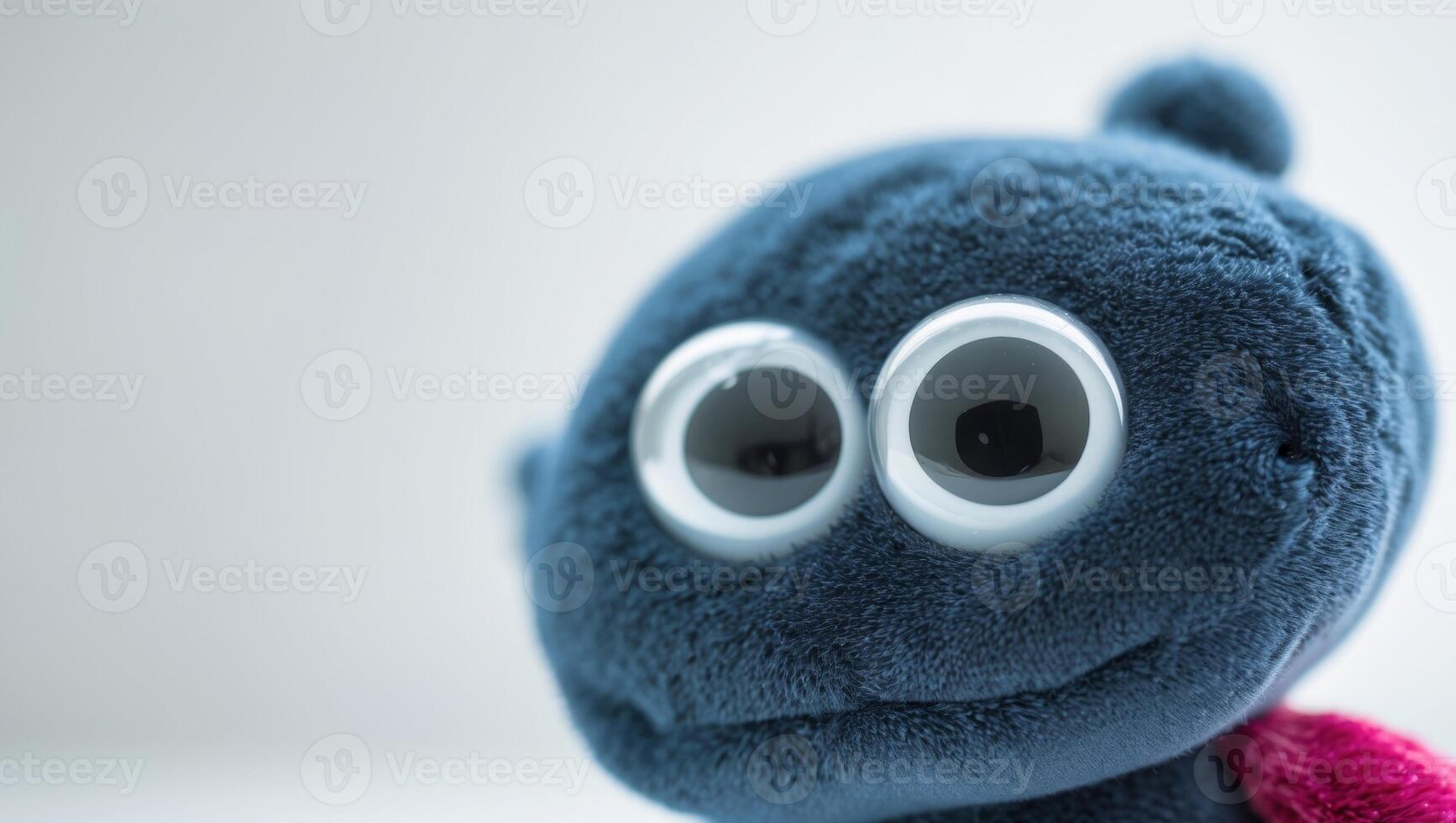A stuffed animal with big eyes photo