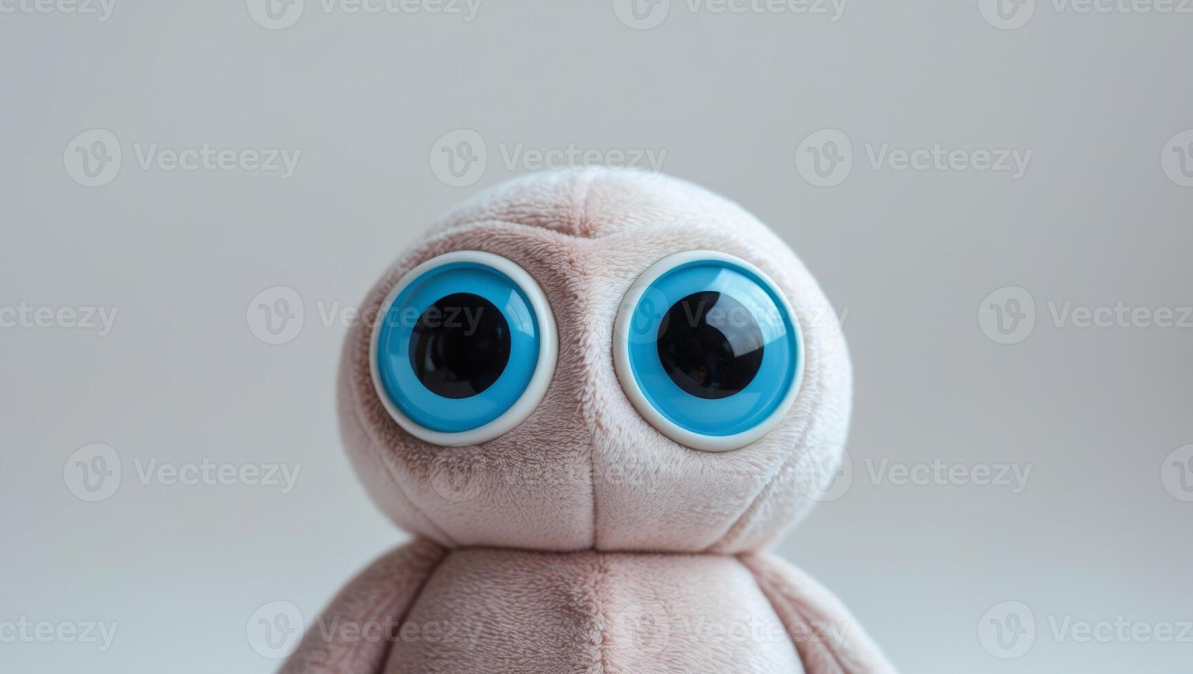 A close up of a fluffy toy with googly eyes photo