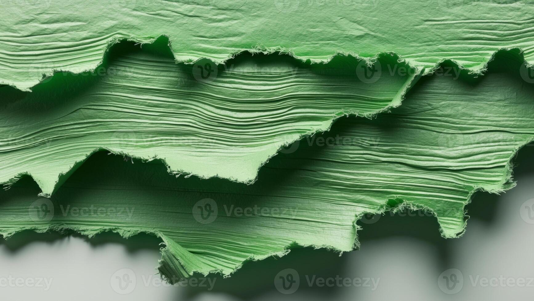 A green paper texture with a wavy pattern photo