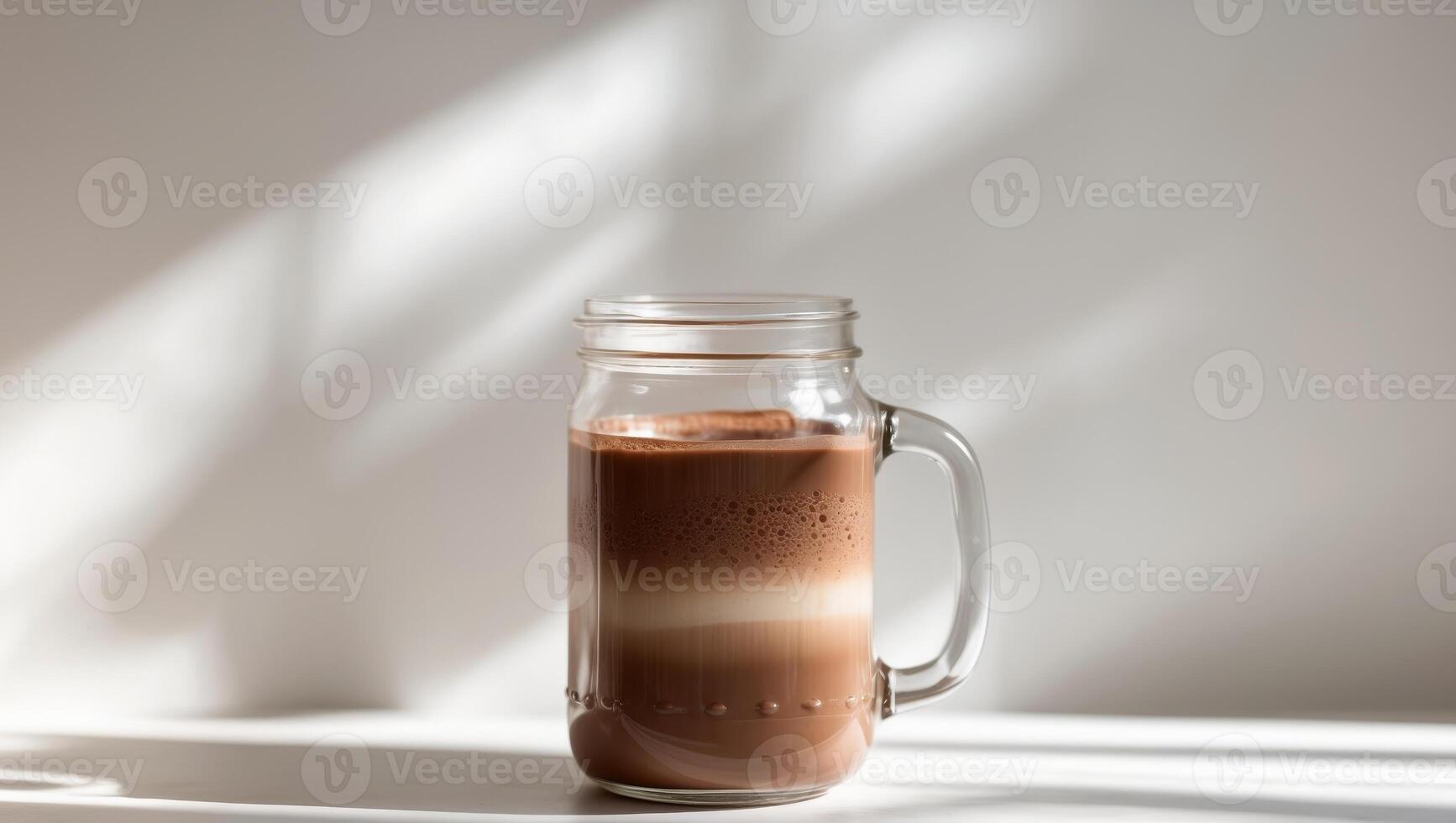 chocolate milk mocha in an artisan glass mason jar. photo