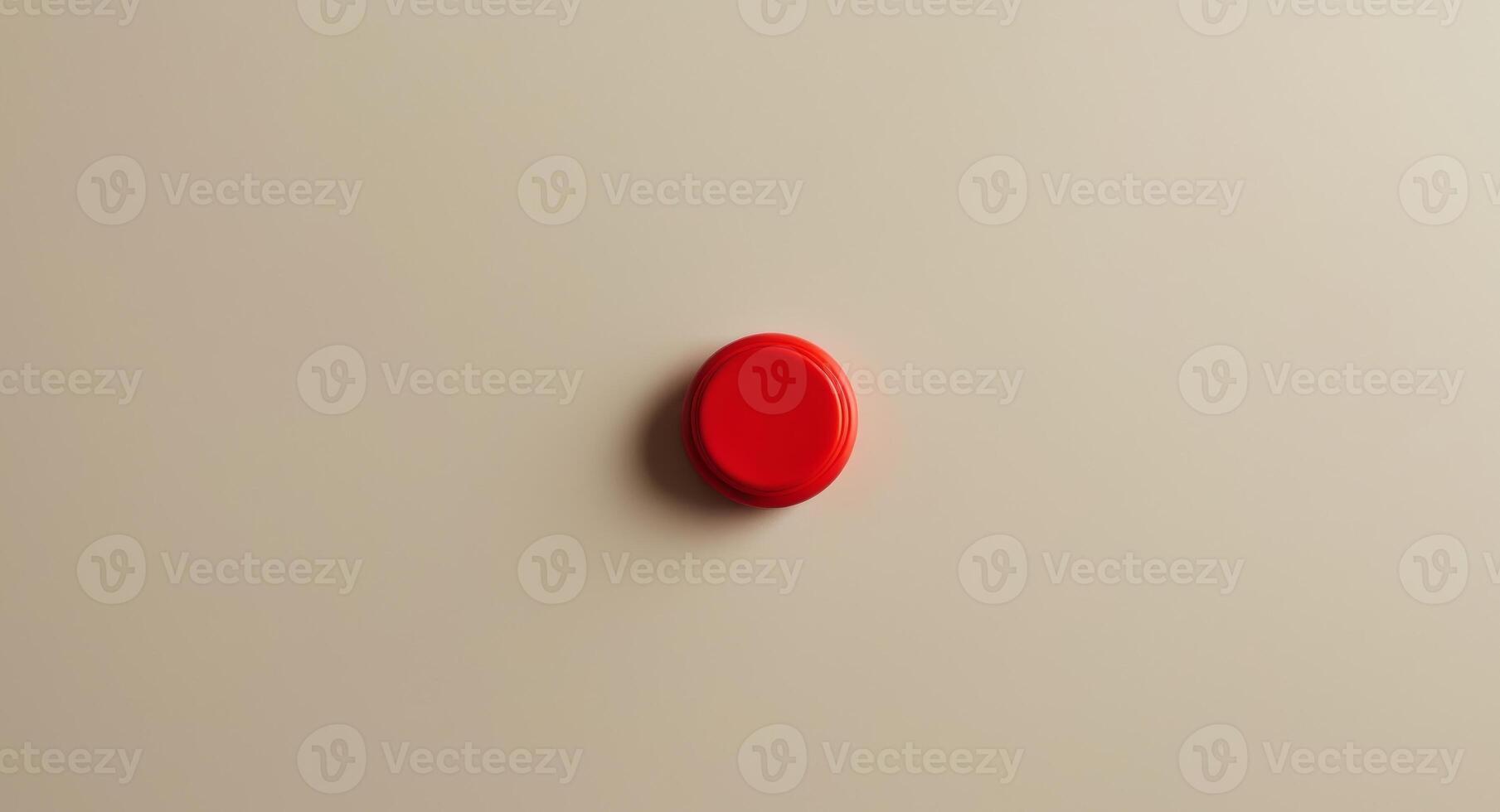 Close up of a Small Red Plastic Calculator Button on a Beige Background. photo
