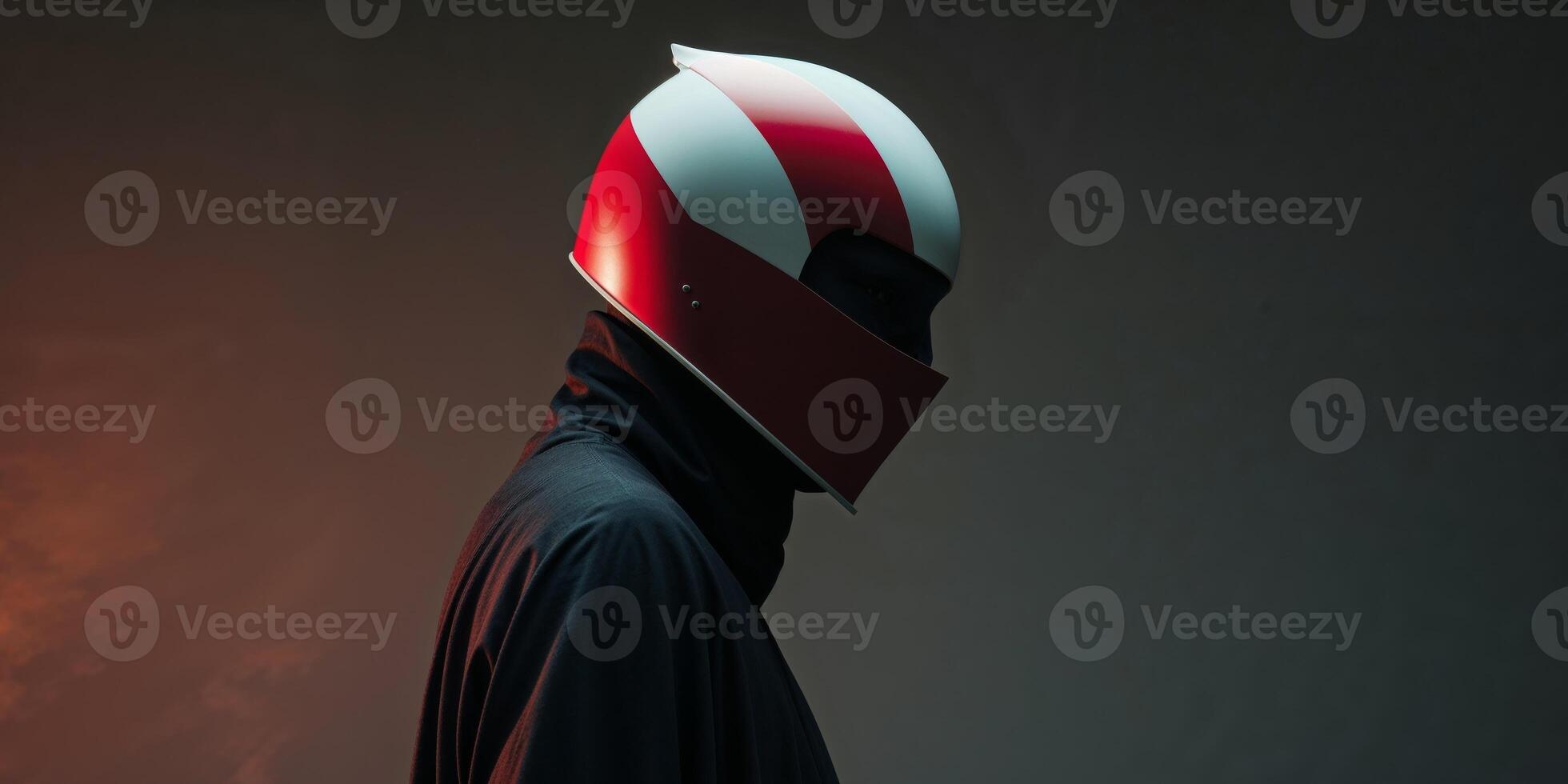 A person wearing a red and white helmet photo