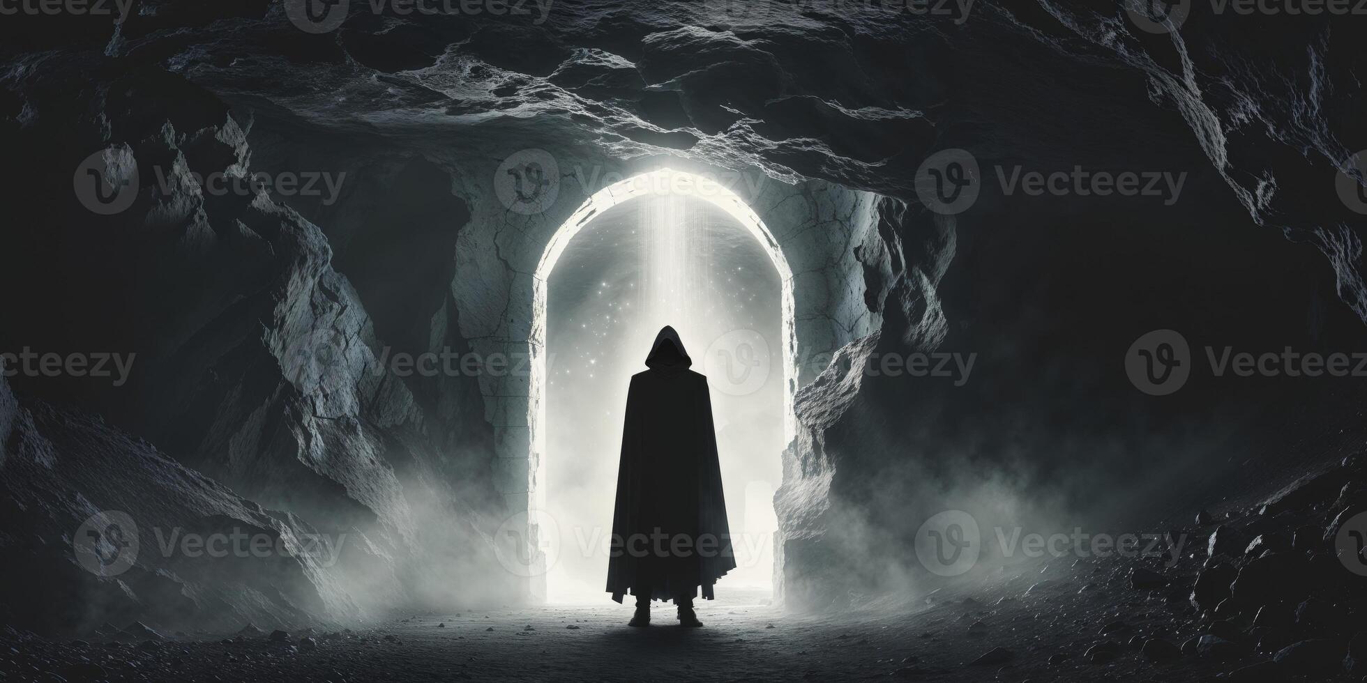 Mysterious figure standing before a glowing portal in a cave setting at twilight photo