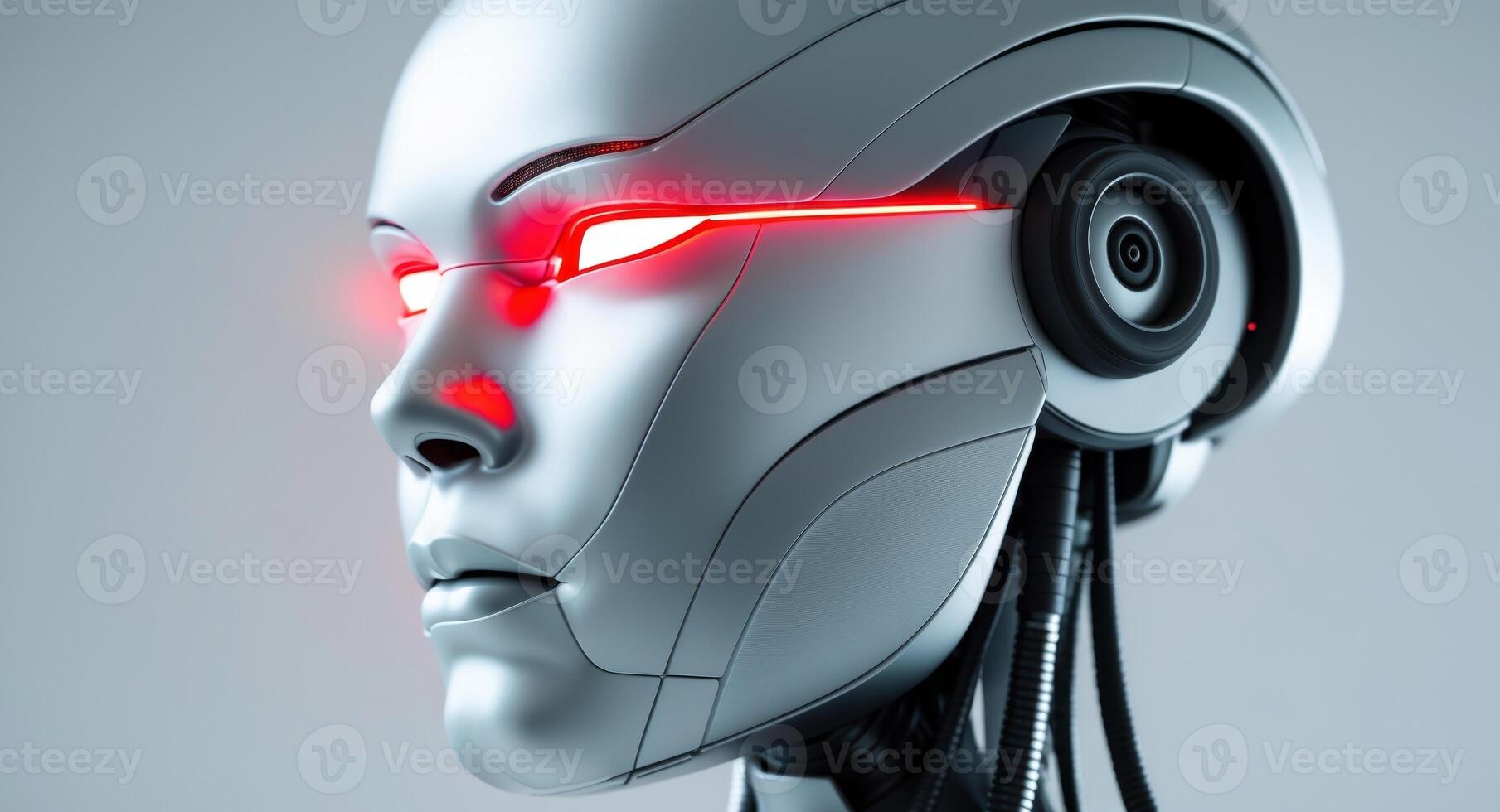 A futuristic robot head with glowing red illuminated features photo