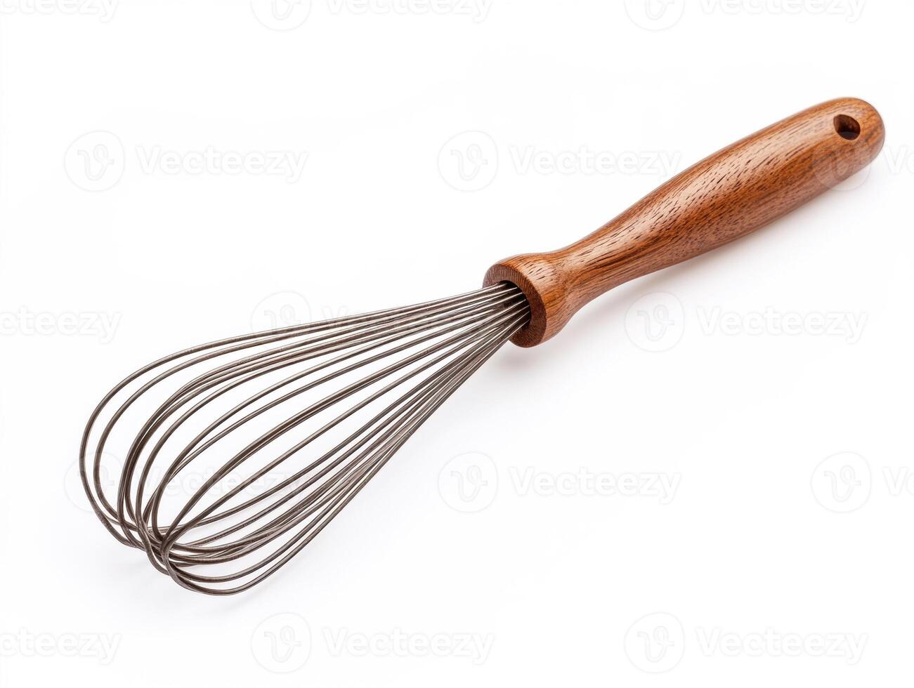 Whisk with wooden handle on white background for kitchen use photo