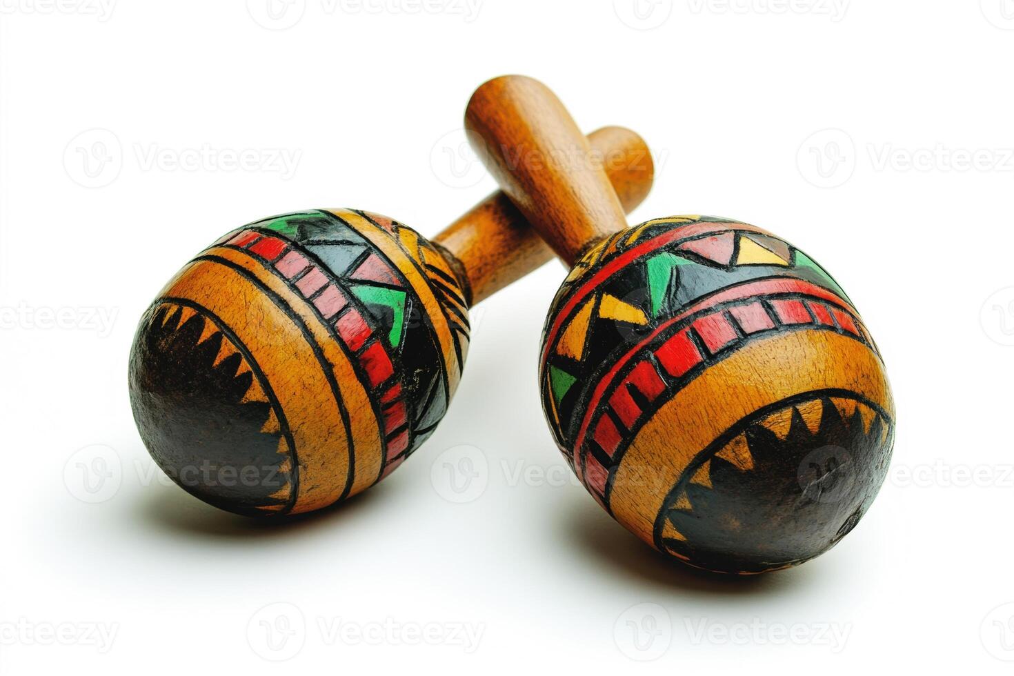 Colorful maracas designed with traditional patterns on wooden surface photo