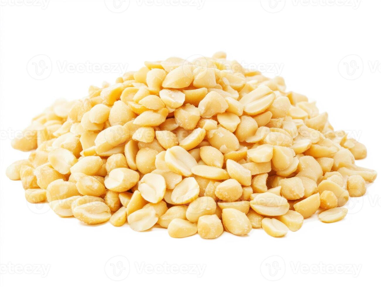 Raw macadamia nuts piled on a white background in daylight photo