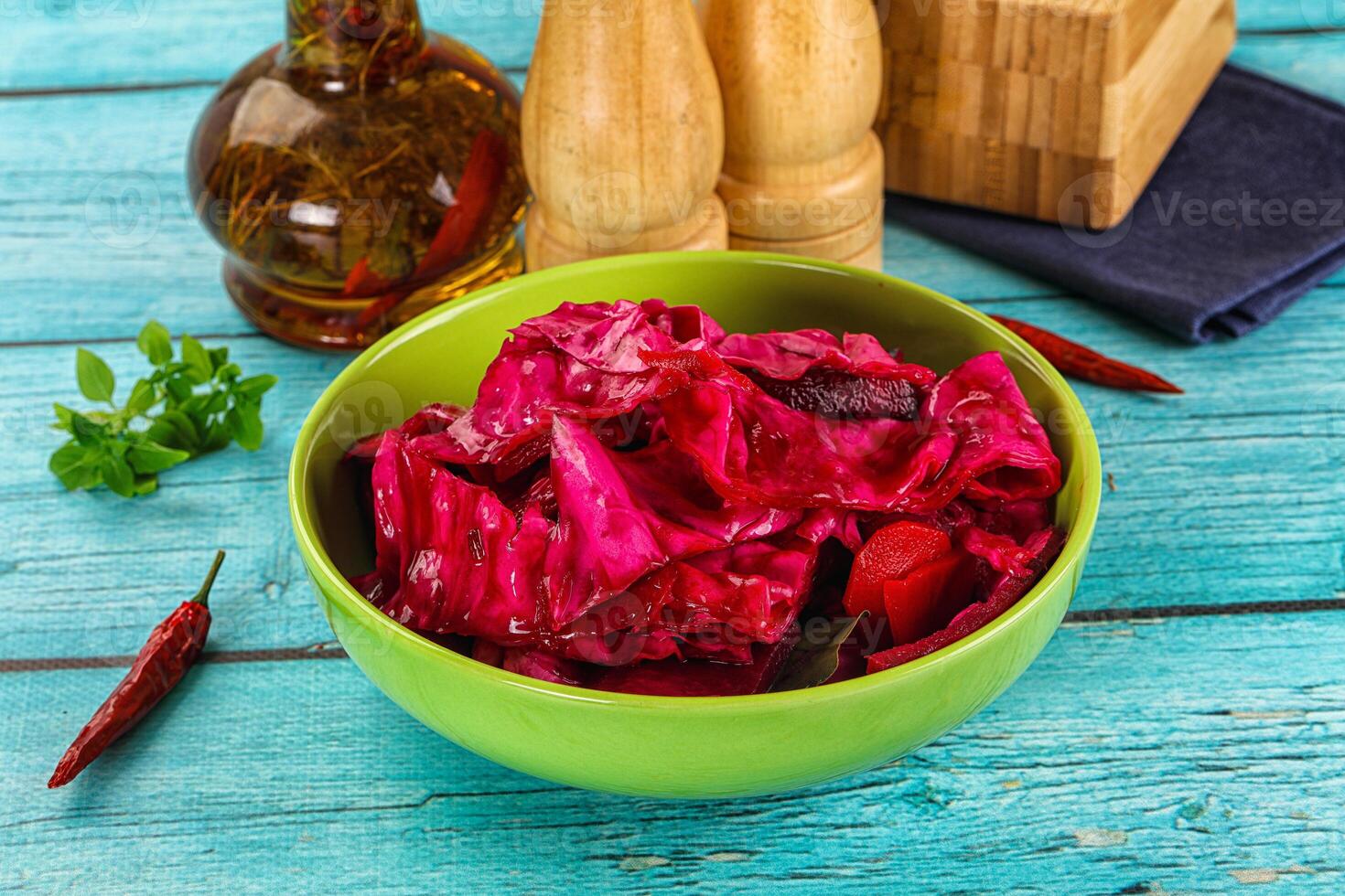 A bowl of red cabbage with spices and herbs photo