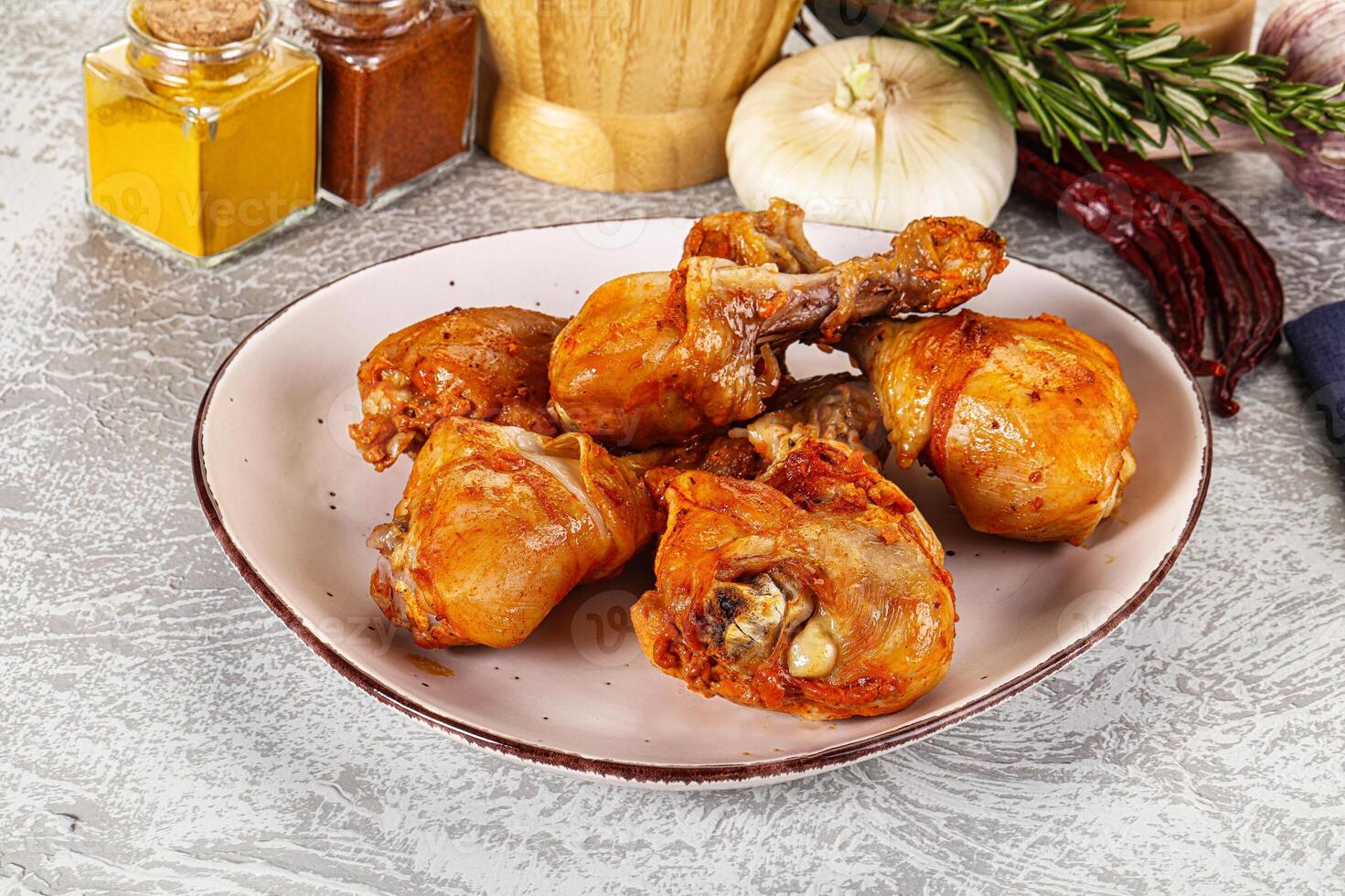 A plate of chicken wings on a table photo