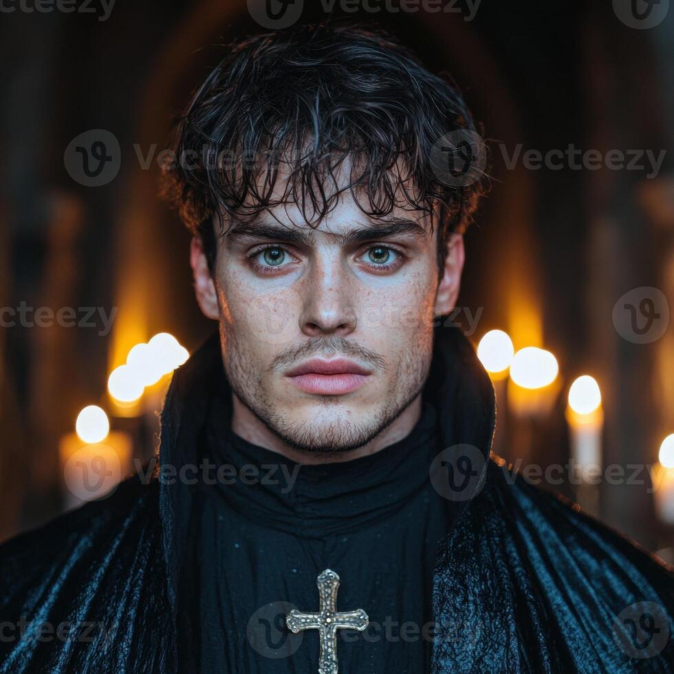 Mysterious man with a cross necklace in a candlelit setting photo