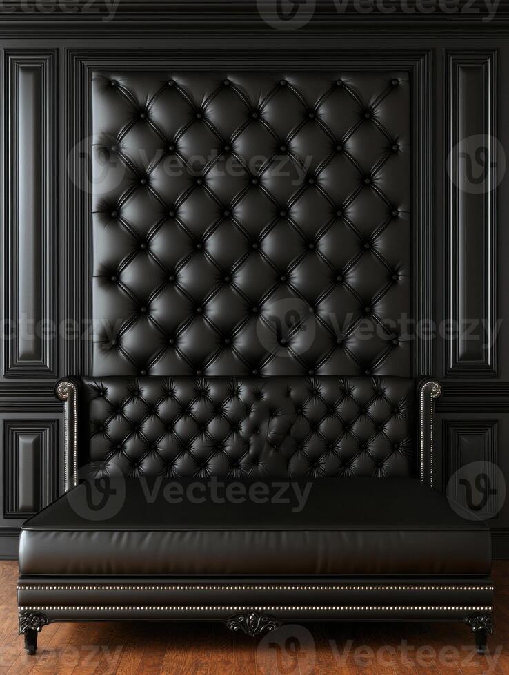 Elegant black tufted leather couch with matching wall paneling photo
