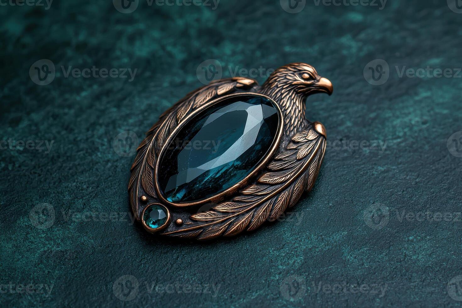 Eagle pendant with a large blue gemstone photo