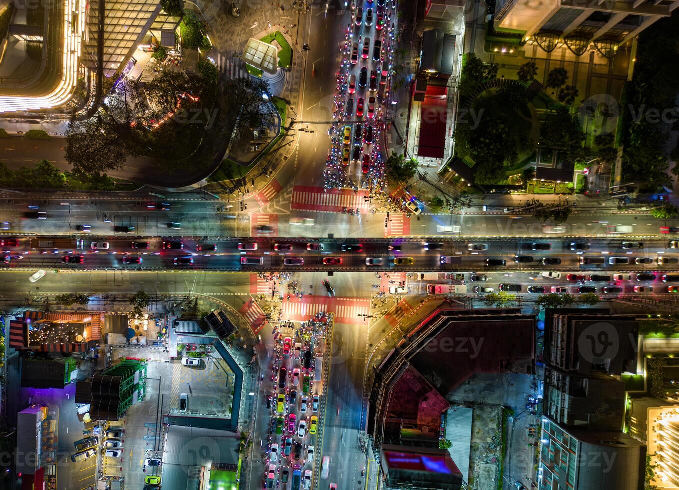 Top View Of Evening Traffic At Intersection In Bangkok, Thailand. photo