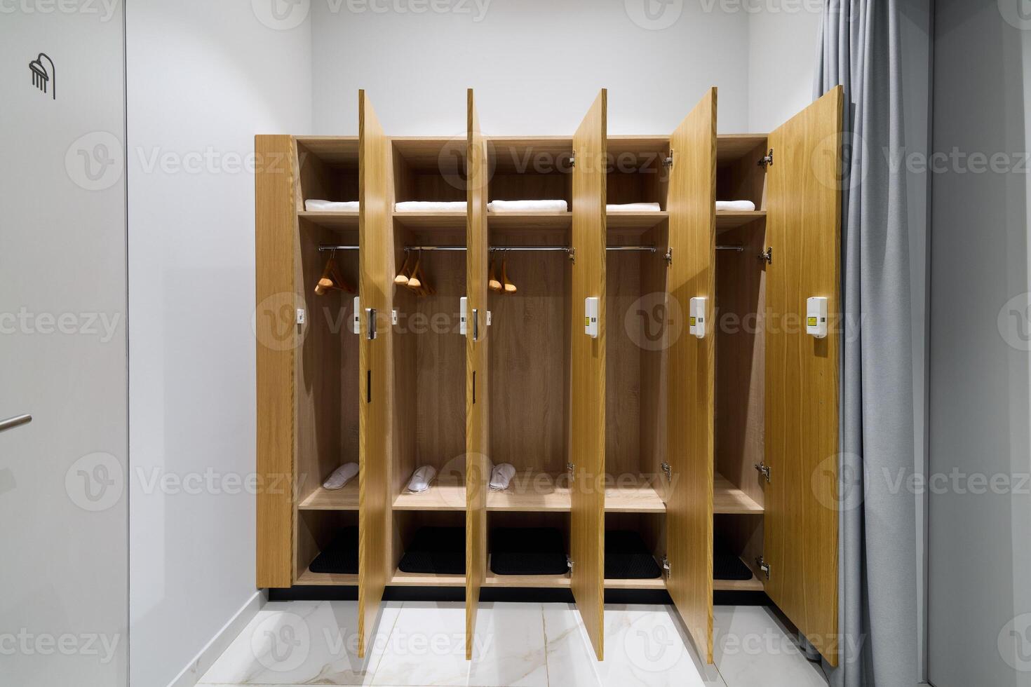 Stylish Modern Wooden Lockers Located Within a Chic and Contemporary Changing Room Environment photo