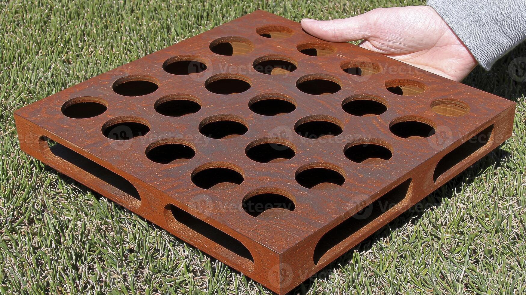 Handcrafted Wooden Board with Circular Holes, Perfect for Games and Educational Activities Outdoors photo