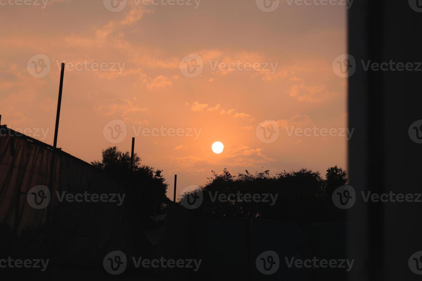 A Serene Sunset Over a Beautiful and Tranquil Landscape that Invites Reflection and Peace photo