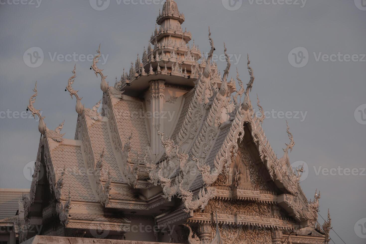 The Magnificent Architectural Detail of a Temple reveals intricate artistry and design photo