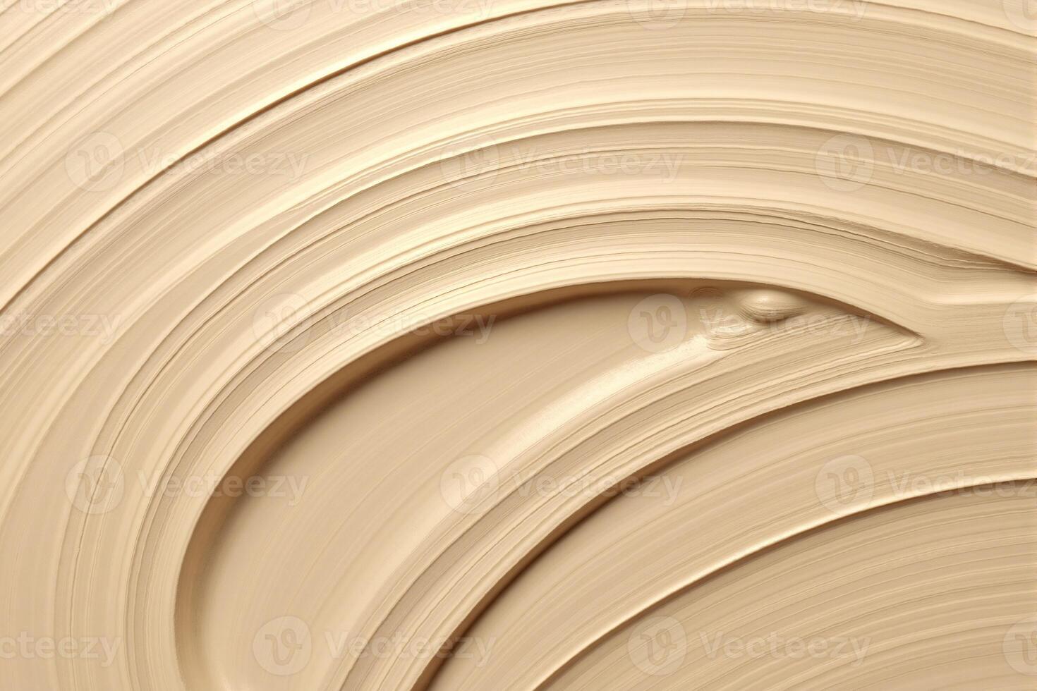 A close up of a cream foundation texture photo