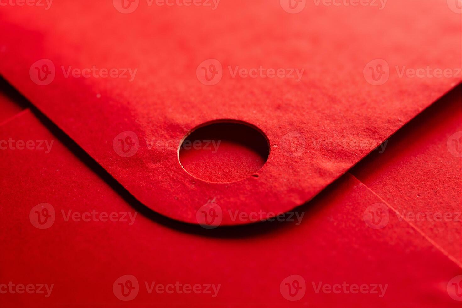 Close up of red envelope with hole photo