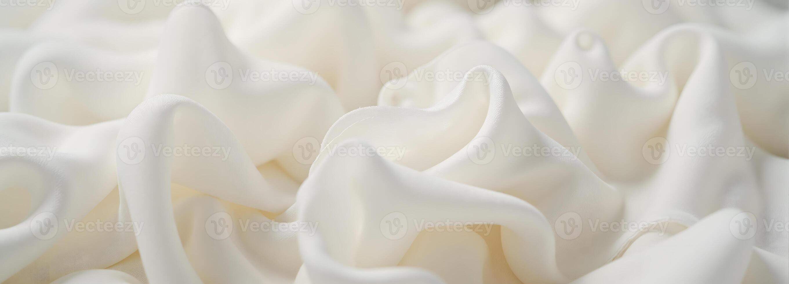 Elegant White Silk Fabric with Soft Folds and Delicate Texture photo