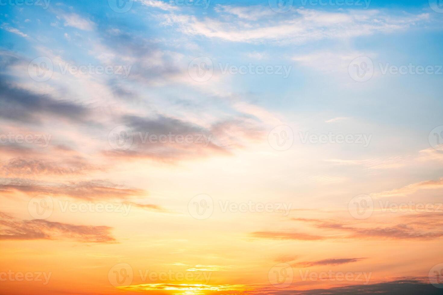 Sky,sunset, beautiful , luxury soft gradient orange gold clouds and sunlight on the blue sky perfect for the background, Sunrise on morning or everning photo